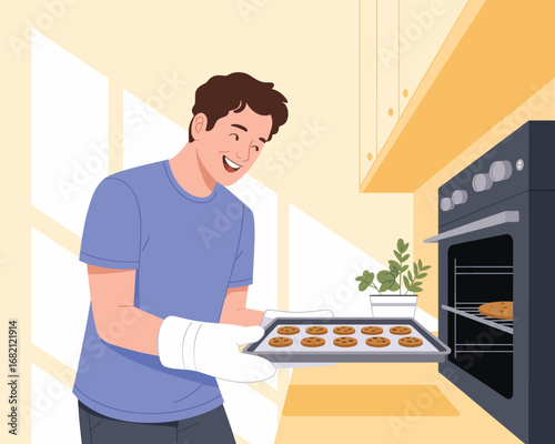 Man happily taking cookies out of the oven