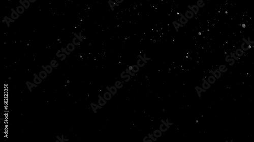 Natural Organic Dust Particles Floating On Black Background. Glittering Sparkling Particles Randomly Spin In The Air With Bokeh. Dynamic Particles With Fast And Slow Motion. Shimmering Dust In Space.