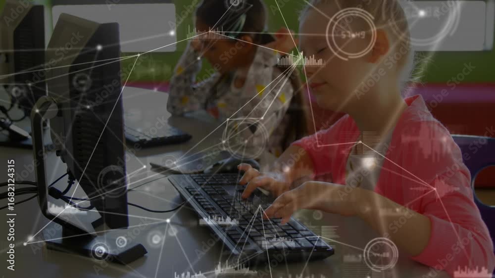 Girls typing code at school computers enabling network overlay pulsing ...