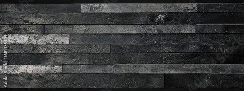 Horizontal Rectangular Stone Wall Texture With Sparkling Details and Varied Tones in Dark Grey and Black