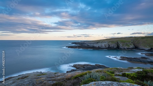 Wallpaper Mural Serene Coastal Cliffs at Dusk: Tranquil Ocean, Dramatic Sky, Long Exposure Photography Torontodigital.ca