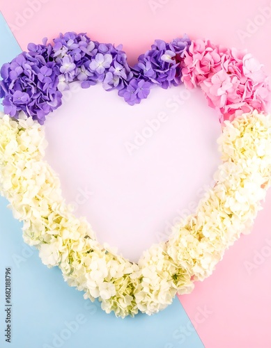 Wallpaper Mural Heart-shaped floral frame on pastel background Torontodigital.ca