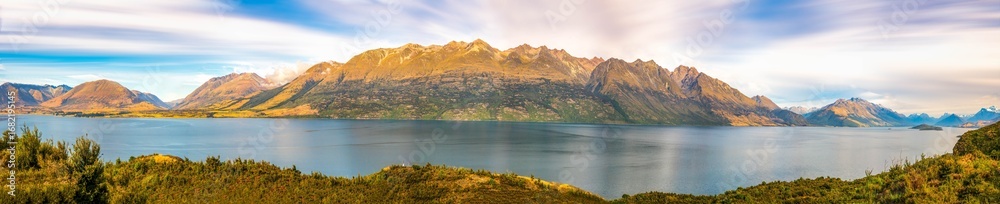 Obraz premium This is a very wide panorama with a glimpse of the Remarkables at Queenstown to Glenorchy on the right. Taken from Bennetts Bluff
