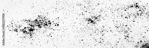 Black splatter and dust particles on transparent background. Abstract grunge texture with scattered dots, smudges, and grainy noise.