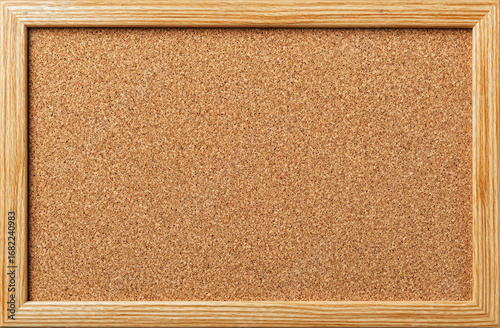 Plain cork bulletin board in light wooden frame