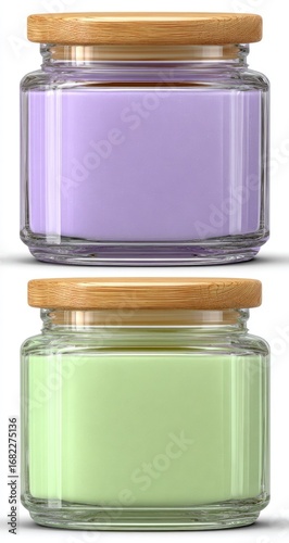 Two square glass jars with wooden lids, containing pastel-colored wax