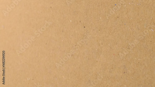 Background of brown kraft paper or cardboard texture, crumpled paper texture as a beige background