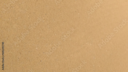 Background of brown kraft paper or cardboard texture, Brown recycled paper texture background.