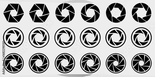 Collection of black camera aperture blades and diaphragm symbols on a light gray background
