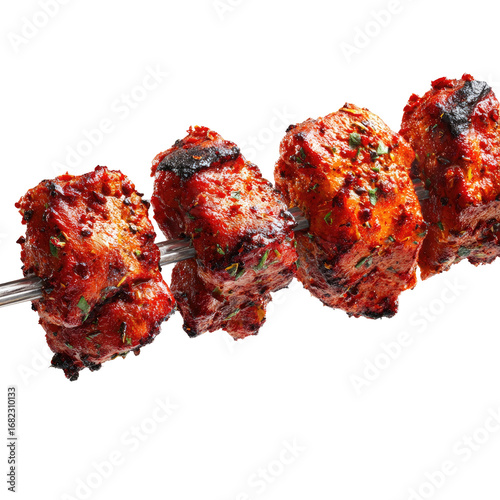 Close-up of four pieces of marinated, grilled chicken skewers, glistening with a spicy, reddish-brown sauce