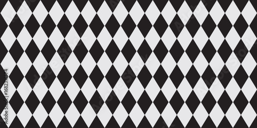 Seamless abstract geometric pattern of multicolored rhombuses in a row on a light background, harlequin motifs, hand drawn illustration,flat style.Seamless Harlequin pattern featuring elegant diamond.