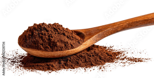 Wooden spoon filled with dark brown powder