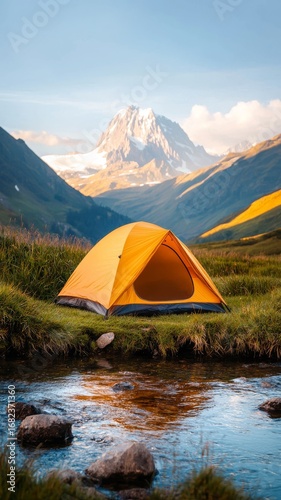 Serene camping scene by a mountain stream