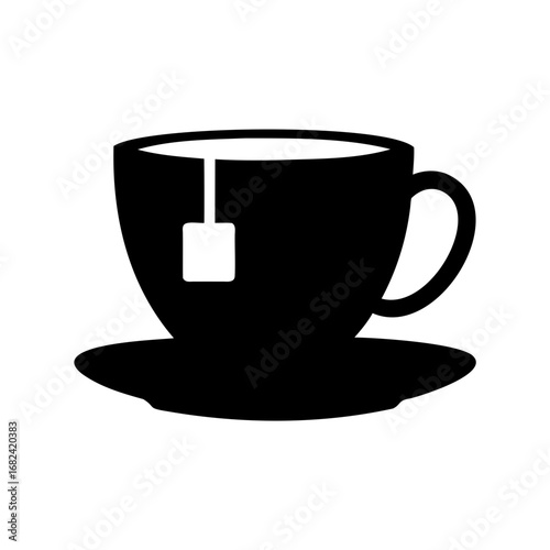 Silhouette of a tea cup with a tea bag on a saucer