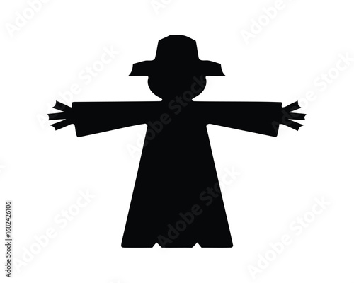 Black silhouette of a scarecrow with outstretched arms and a hat
