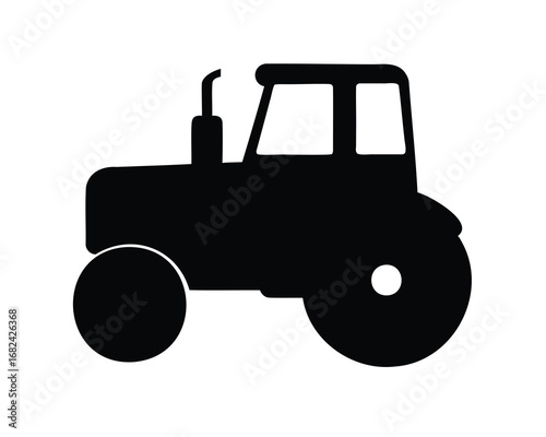 Silhouette of a tractor used in farming and agriculture work