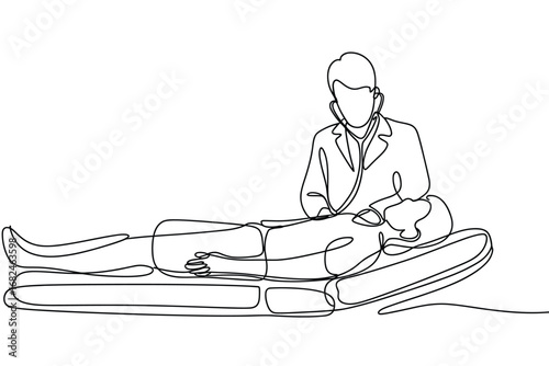 Doctor examining patient lying down in medical setting