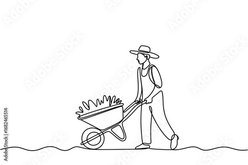 Farmer pushing wheelbarrow filled with harvested produce
