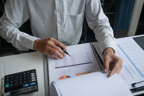 Auditor Reviewing Financial Statement for Accuracy