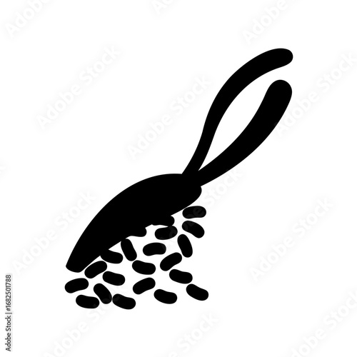 Silhouette illustration of grains or beans pouring from a scoop or ladle