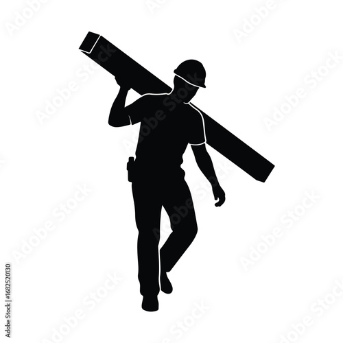 Silhouette of a construction worker carrying a heavy wooden plank