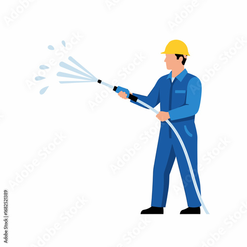 A worker in blue overalls sprays water from a hose, aiming the stream.