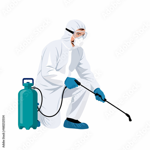 A worker in a white protective suit and mask kneels to spray disinfectant from a pressure tank.