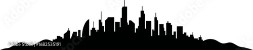 Dramatic silhouette of a sprawling city skyline under a bright sky