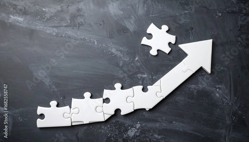 Puzzle pieces form a rising arrow against a textured dark background, symbolizing progress and strategy, with a single piece hovering above