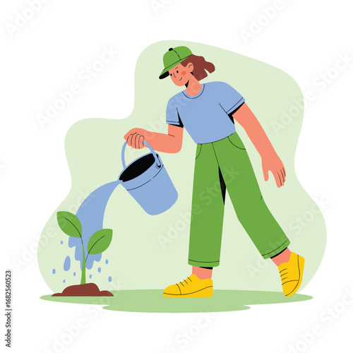 Young woman watering plant with bucket in garden for ecofriendly lifestyle