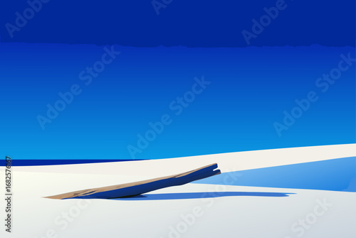 A solitary piece of driftwood rests on a vast sun drenched sand dune under a clear blue sky
