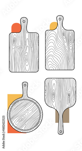 Collection of four hand drawn wooden cutting boards and pizza paddles for culinary use