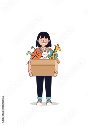 A happy youngster holds a cardboard container filled with diverse playthings and recreational items for enjoyment