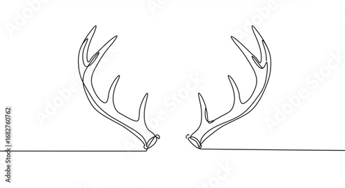 Elegant single line drawing captures the majestic spread of deer antlers, symbolizing nature's artistry.