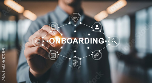 Onboarding in Action: A focused individual traces a digital onboarding concept, highlighting key elements of a new beginning and the smooth introduction of a new user experience.