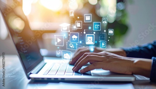 Hands type on a laptop with abstract digital icons floating, suggesting a connection to online services and information in a bright, airy setting