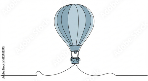 Hot air balloon floating in sky with basket