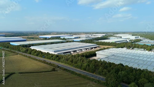 Wallpaper Mural Summer evening drone shot of large industrial park Magna Park Lutterworth England UK with warehouses factories distribution centres and retail logistics Torontodigital.ca