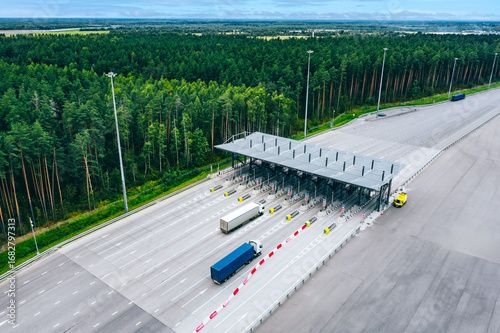 фотографія Aerial drone view on motorway with toll collection point, freeway toll booth