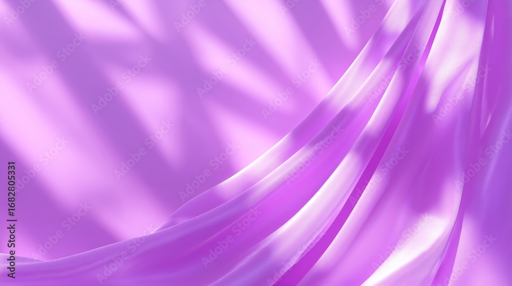 Naklejka premium Soft purple fabric drapes gracefully with light playing on its surface in an artistic display