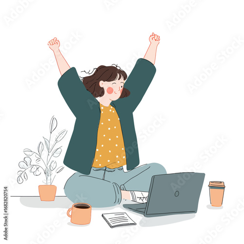 A young woman with a joyful expression raises her arms in celebration while sitting cross-legged on the floor. Her laptop is open in front of her, and she has a cup of coffee and a notepad nearby.