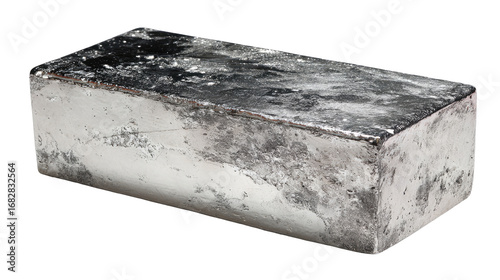 Rectangular, heavy, metallic ingot.  Rough, mottled gray surface