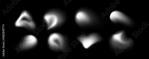 Blur shape blob collection with soft white gradient forms on black background for abstract design and overlay effects. Smooth organic modern elements with diffused blurry edges and glowing spots