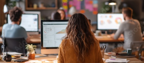 Team working at computers in an office