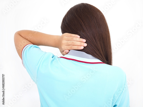 Woman is holding her neck and she is in pain. Health and medical concept.