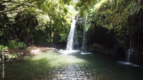 Blanjar Waterfall, captured on September 3, 2025. Scenic tropical waterfall surrounded by lush bamboo forest, peaceful escape in tropical landscape