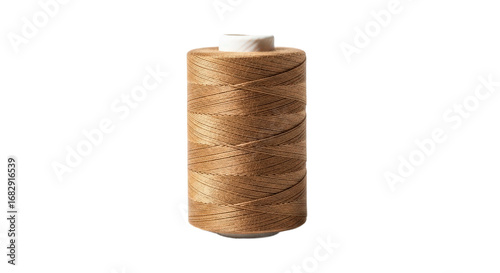 Spool of brown thread used in sewing and crafts. Textile, fiber, material, sewing hobby, crafting, garment construction, needlework, apparel creation