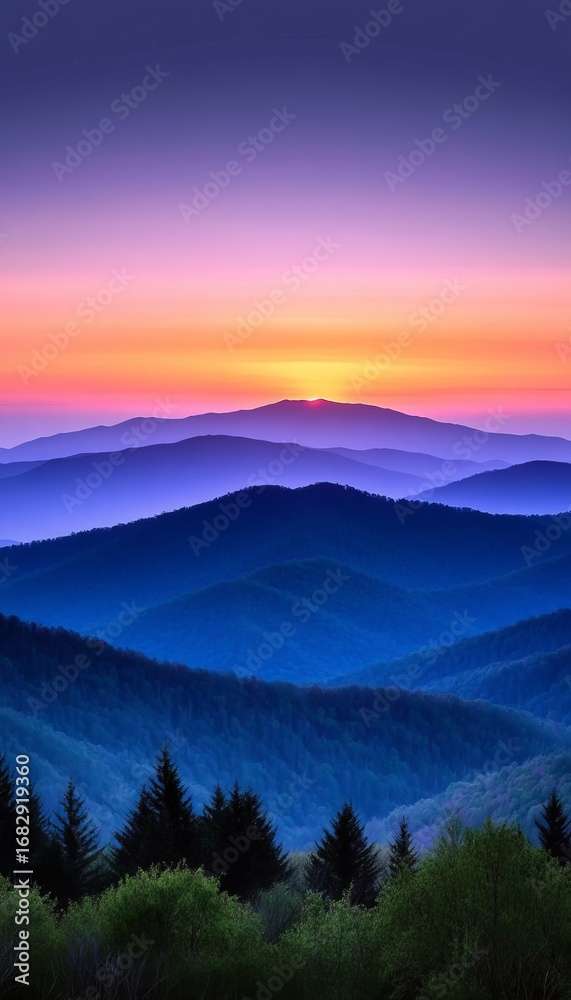 Obraz premium Serene Mountain Range at Twilight, Peaks Silhouetted Against a Colorful Sunset Sky at Dusk