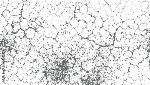 Cracked dry earth pattern with scattered dark spots ground texture