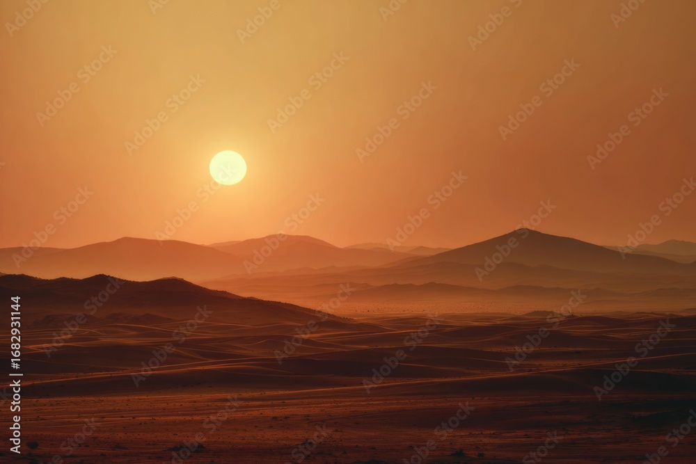 Fototapeta premium Wide desert landscape with glowing sun setting behind distant dunes, warm golden orange gradient sky